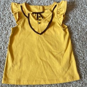 Gold Janie and Jack shirt with decorative neck line. New with tags.